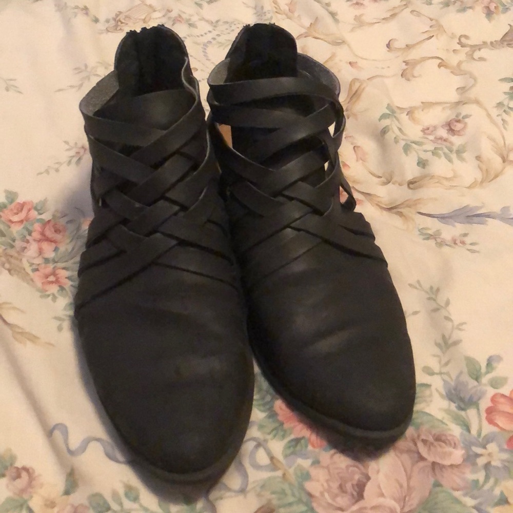 Black booties with criss cross straps